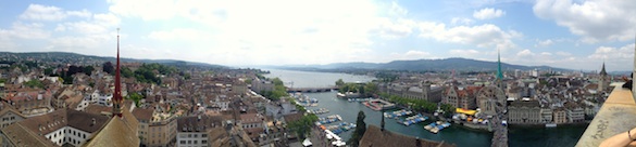 Panoramic view of Zurich atop a church tower.