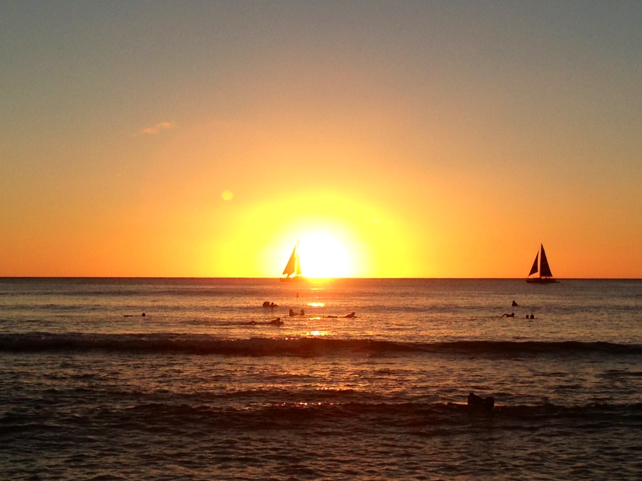 Hawaiian Sunset With Sailboat In Retirement