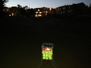Coaching tennis until dark