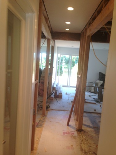 Combining two rooms into one large master bedroom, removed two bathrooms and two closets to make one of each