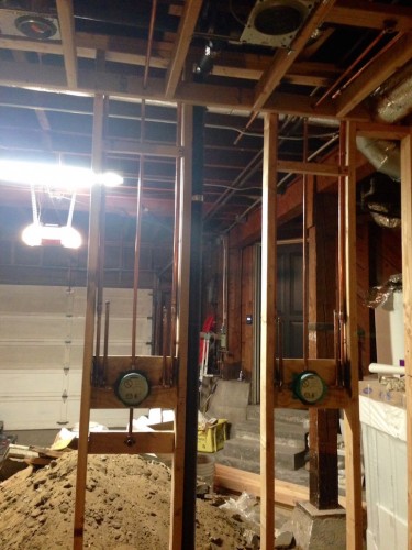 Rough of double shower looking towards garage