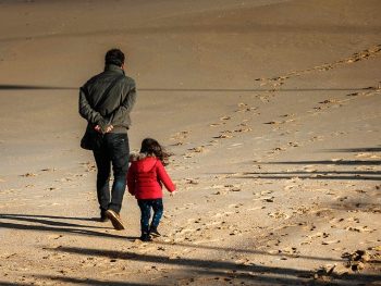 Father and daughter walking on the beach - Things I'll Teach My Daughter