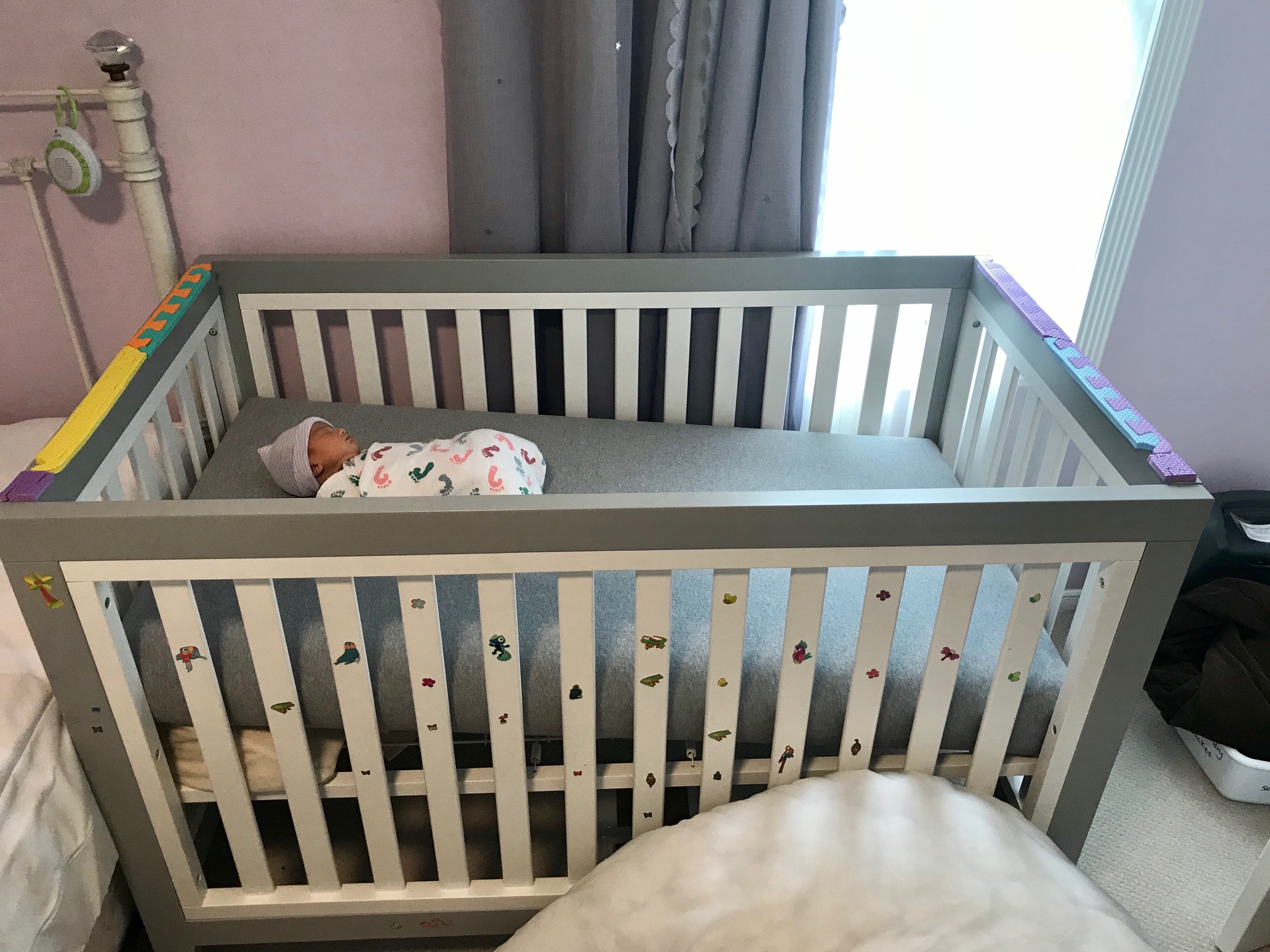 Baby girl in crib